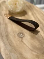 monogram wristlet strap