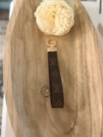 monogram wristlet strap